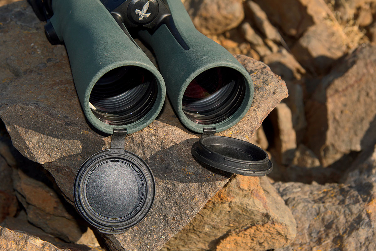 Swarovski’s objective lens covers snap into the end of the binocular barrels to keep them clear of moisture or dust. They are tethered to the bottom of the binocular barrels to prevent loss but can be removed if desired.